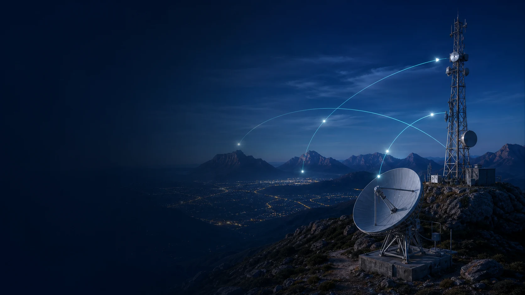 Telecommunications tower and satellite ground station overlooking a South African landscape at dusk